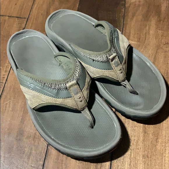 brown teva flip flops